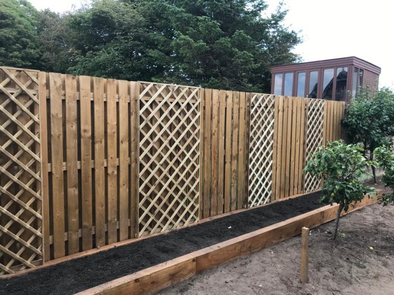 Tall wooden fencing for gardens